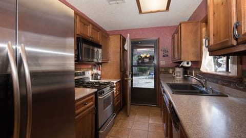 Premium Cabin, 2 Bedrooms | Private kitchen | Fridge, microwave, stovetop, coffee/tea maker