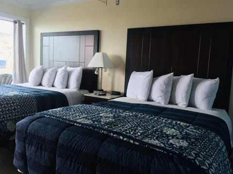 Standard Suite, 2 Bedrooms, Partial Ocean View | Premium bedding, pillowtop beds, blackout drapes, free WiFi