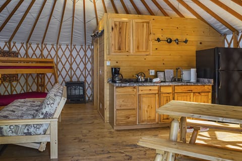 Room (Yurt, No Pets, Linens Available) | Living area | Flat-screen TV, DVD player, table tennis