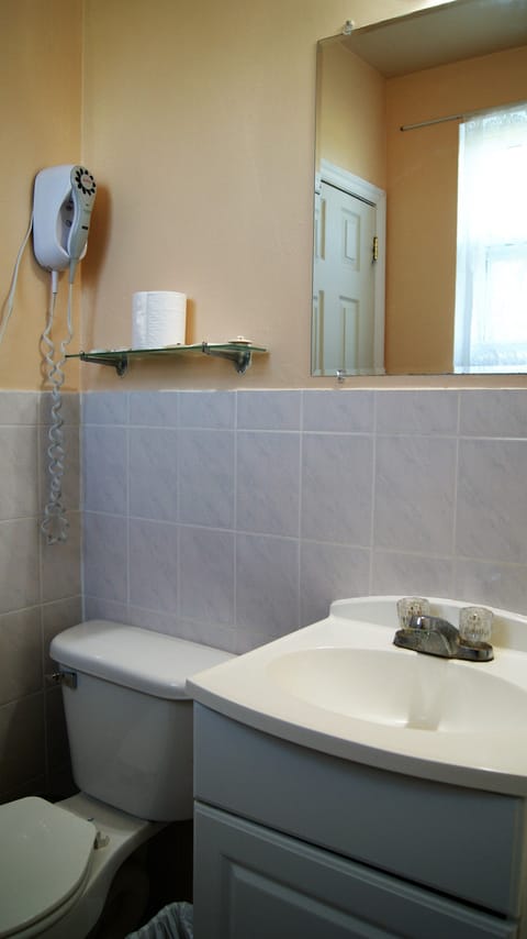 Standard Room, 2 Double Beds, Smoking | Bathroom | Free toiletries, hair dryer, towels