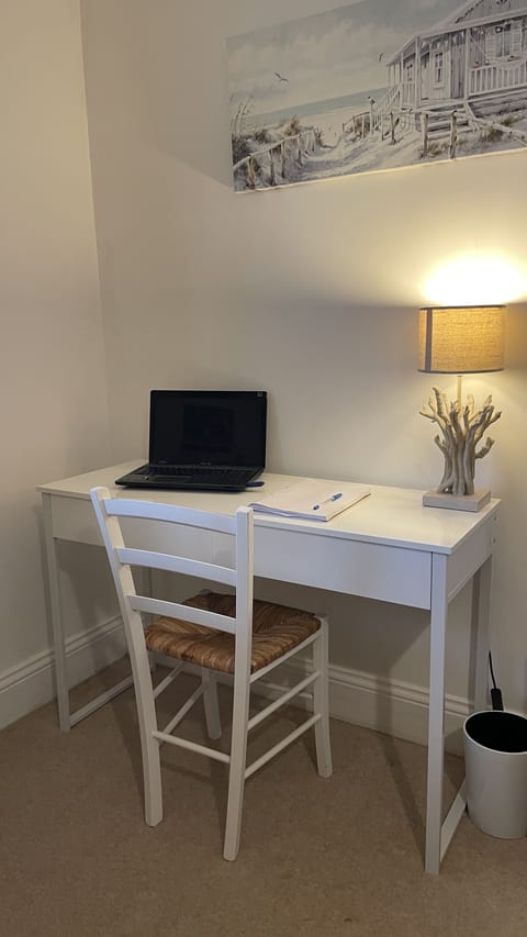 The desk located in the second bedroom offers space to work if needed
