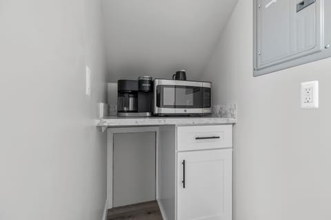 This compact kitchen is perfect for couples or solo travelers who want to save space.