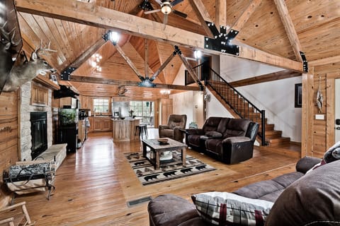 Luxury Cabin | Living area | TV, fireplace, DVD player