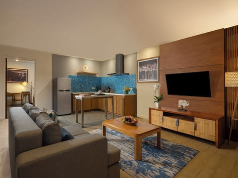One Bedroom Apartment Suite         | Living area | LED TV, DVD player