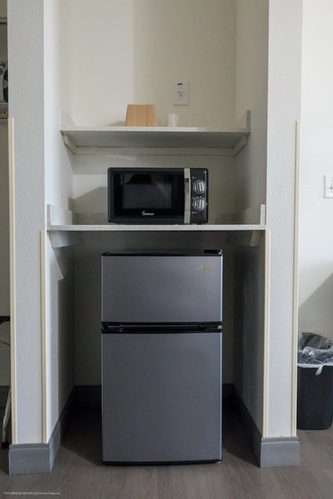 Economy Double Room, 2 Queen Beds, Non Smoking, Refrigerator & Microwave | 1 bedroom, premium bedding, Tempur-Pedic beds, individually furnished