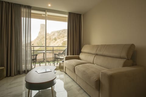 Suite Prestige | Living area | Flat-screen TV