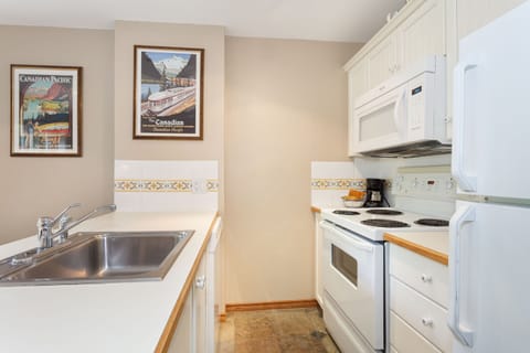 Condo, 1 Bedroom (# 130) | Private kitchen | Full-size fridge, microwave, oven, stovetop