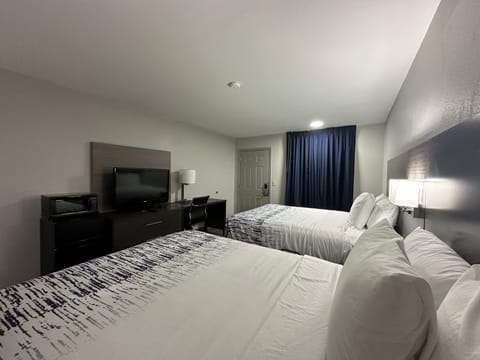 Deluxe Room, 2 Queen Beds, Smoking, Refrigerator & Microwave | Premium bedding, pillowtop beds, laptop workspace, blackout drapes