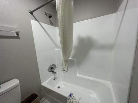 Combined shower/tub, hair dryer, towels, soap