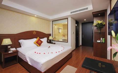 Deluxe Room, Balcony, Partial Sea View | Bathroom | Hair dryer, bathrobes, slippers, towels