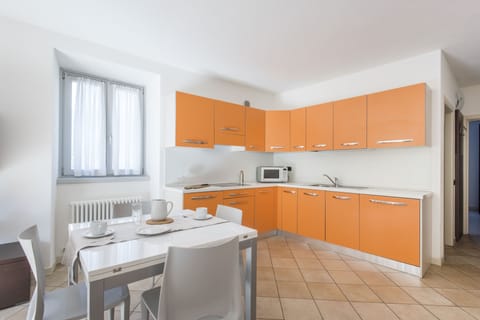 Apartment, 1 Bedroom (4 adults) | Private kitchen | Fridge, microwave, stovetop, dishwasher