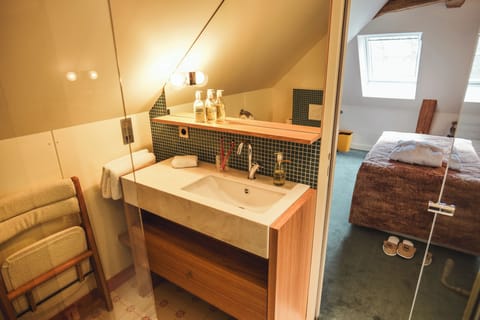 Superior Double Room | Bathroom | Designer toiletries, hair dryer, towels, soap
