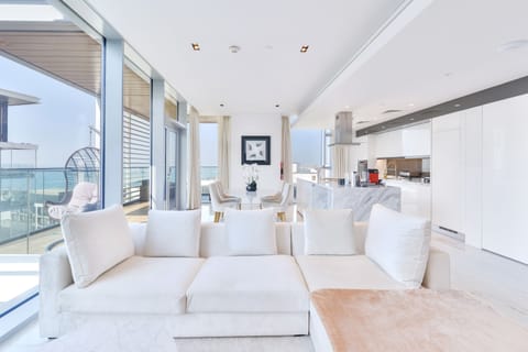 Grand Apartment, 2 Bedrooms, Sea View, Beachfront | Living area | 75-inch LED TV with satellite channels, TV, Netflix