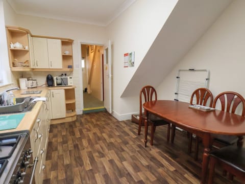 Fridge, electric kettle, toaster, cookware/dishes/utensils