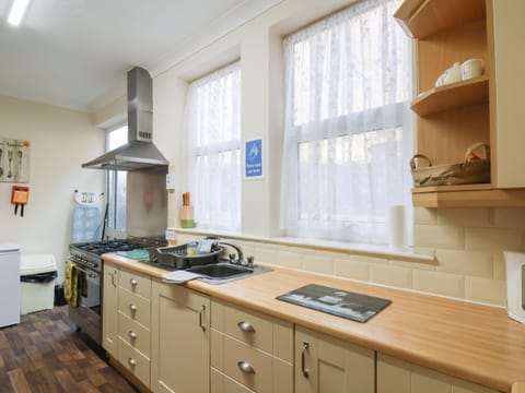 Fridge, electric kettle, toaster, cookware/dishes/utensils