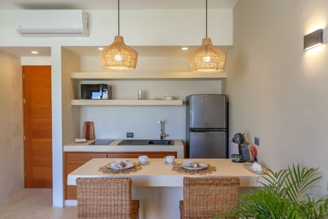 Balcony Suite | Private kitchen | Full-size fridge, microwave, stovetop, espresso maker