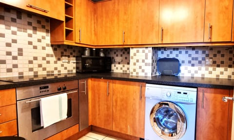 Classic Apartment, 2 Bedrooms | Private kitchen | Full-size fridge, microwave, oven, stovetop