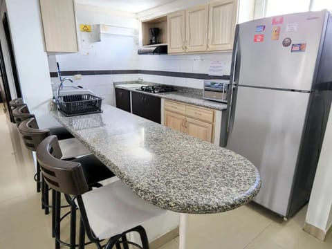 Signature Apartment | Private kitchen | Full-size fridge, stovetop, blender