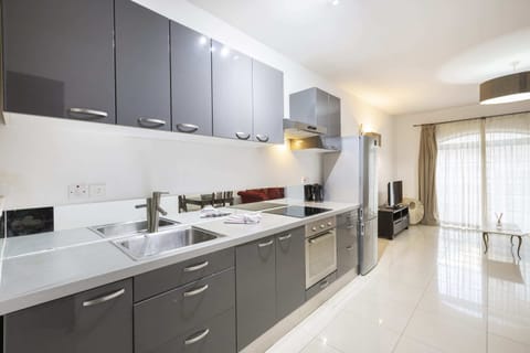 Basic Apartment, Multiple Beds | Private kitchen | Fridge, oven, stovetop, electric kettle