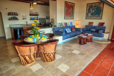 Designer decor with natural fabrics, majestic artwork and granite floors.