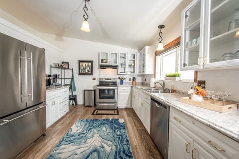 Fully equipped kitchen with electric stove