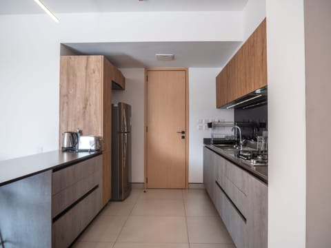 Apartment, 3 Bedrooms | Private kitchen | Fridge, microwave, electric kettle, cookware/dishes/utensils