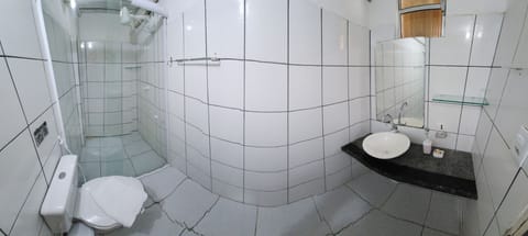 Standard Quadruple Room | Bathroom | Shower, rainfall showerhead, towels, soap