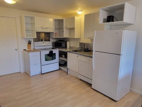 Apt 5 Ground Floor:  Hood River Suites Extended Stay Downtown | Private kitchen | Full-size fridge, microwave, oven, stovetop