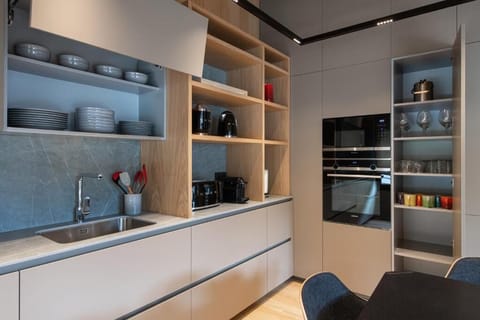 Elite Apartment | Private kitchen | Fridge, microwave, oven, stovetop