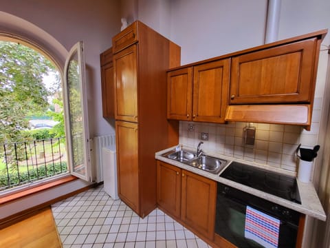 Comfort Apartment | Private kitchenette | Full-size fridge, oven, stovetop, coffee/tea maker