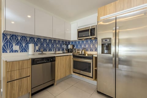 Family Condo | Private kitchen | Microwave, oven, stovetop, dishwasher