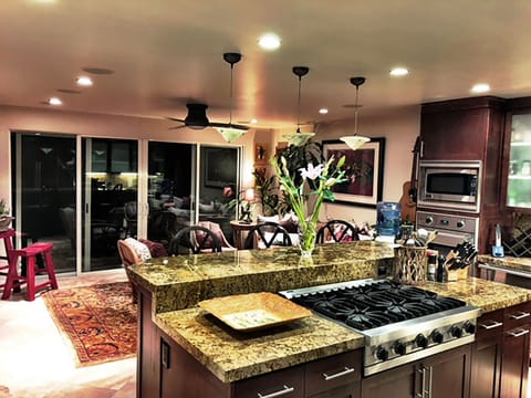 Gourmet kitchen with Zen den off the pool 