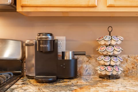 Fully equipped kitchen with Keurig coffee machine, fridge, dishwasher, microwave