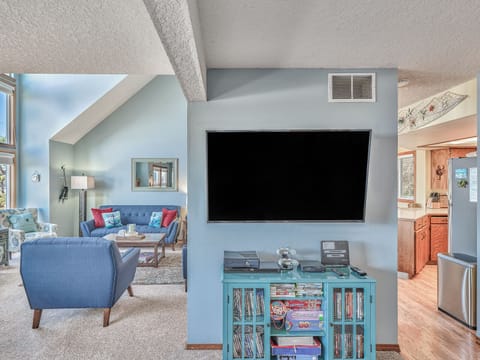 family room with 55" 4K Roku TV with Blu-ray and XBOX 360. 
