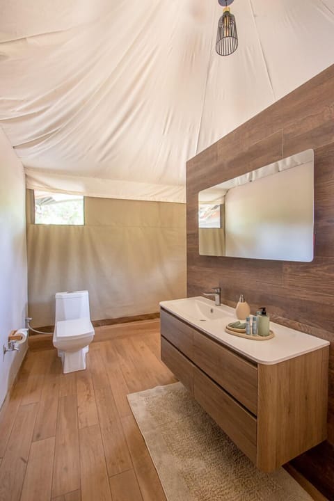 Family Tent, 2 Bedrooms, Patio, River View | Bathroom | Shower, rainfall showerhead, designer toiletries, towels