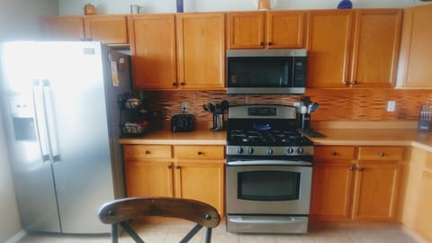 Gas stove with electric convection oven