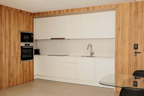 Family Apartment, 3 Bedrooms, Balcony | Private kitchen | Full-size fridge, microwave, oven, stovetop