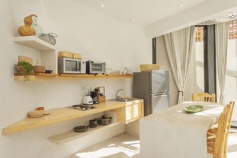 Signature Apartment | Private kitchenette | Full-size fridge, microwave, stovetop, coffee/tea maker