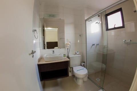 Standard Room | Bathroom | Hair dryer, towels, soap, shampoo