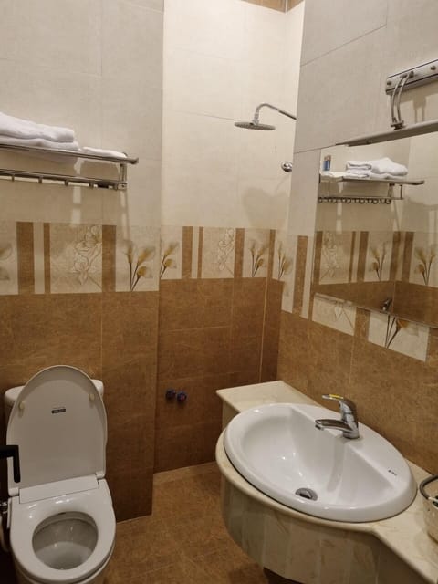 Family Shared Dormitory | Bathroom | Separate tub and shower, hydromassage showerhead, hair dryer, bathrobes