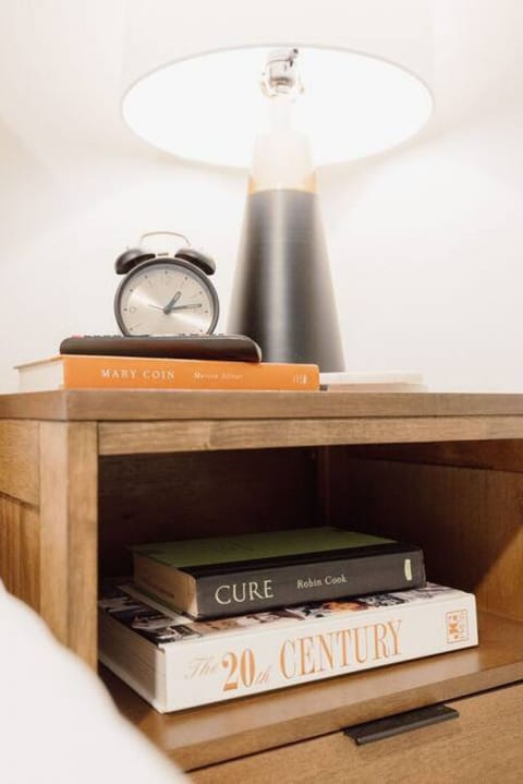 Keep your stuff organized by using this spacious nightstand