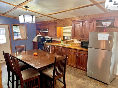 Full kitchen with table 