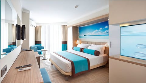 Standard Double or Twin Room, Sea View | Free minibar, in-room safe, desk, free cribs/infant beds