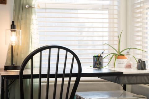 Work station in the upstairs bedroom is quiet, well lit, and let’s you watch the clouds roll by :)