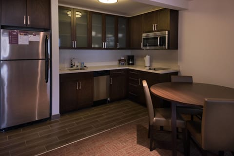 Suite, 2 Bedrooms | Private kitchen | Full-size fridge, microwave, stovetop, dishwasher