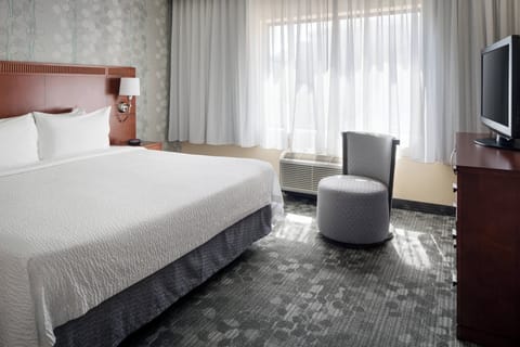 Premium bedding, pillowtop beds, desk, laptop workspace