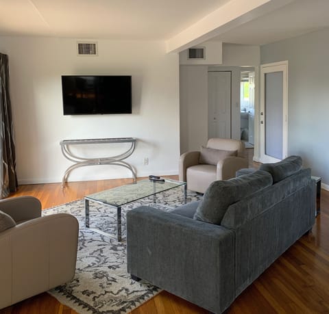 Two Bedroom Grande Suite | Living area | Flat-screen TV