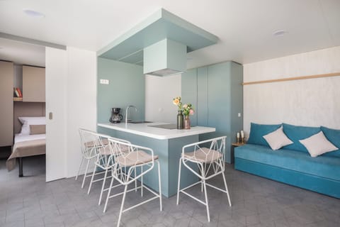 Luxury Holiday Home with pool | Living area | Flat-screen TV