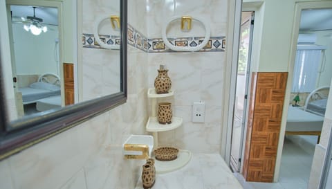 Deluxe Villa | Bathroom | Rainfall showerhead, towels, soap, shampoo