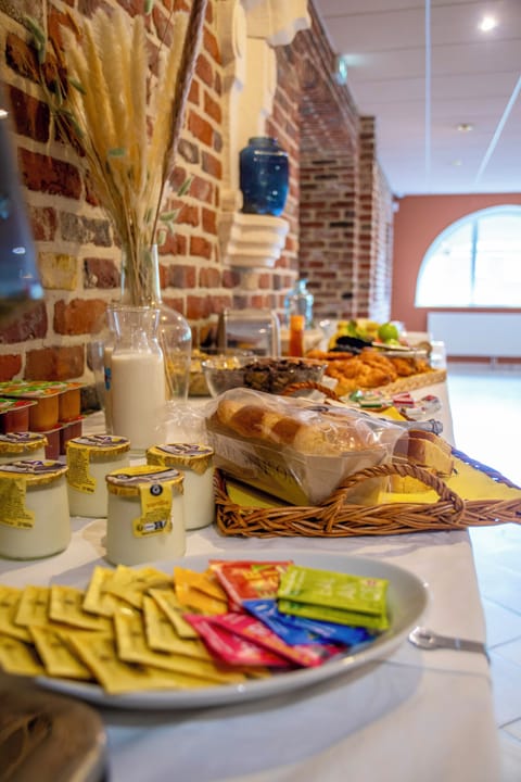 Daily buffet breakfast (EUR 15 per person)